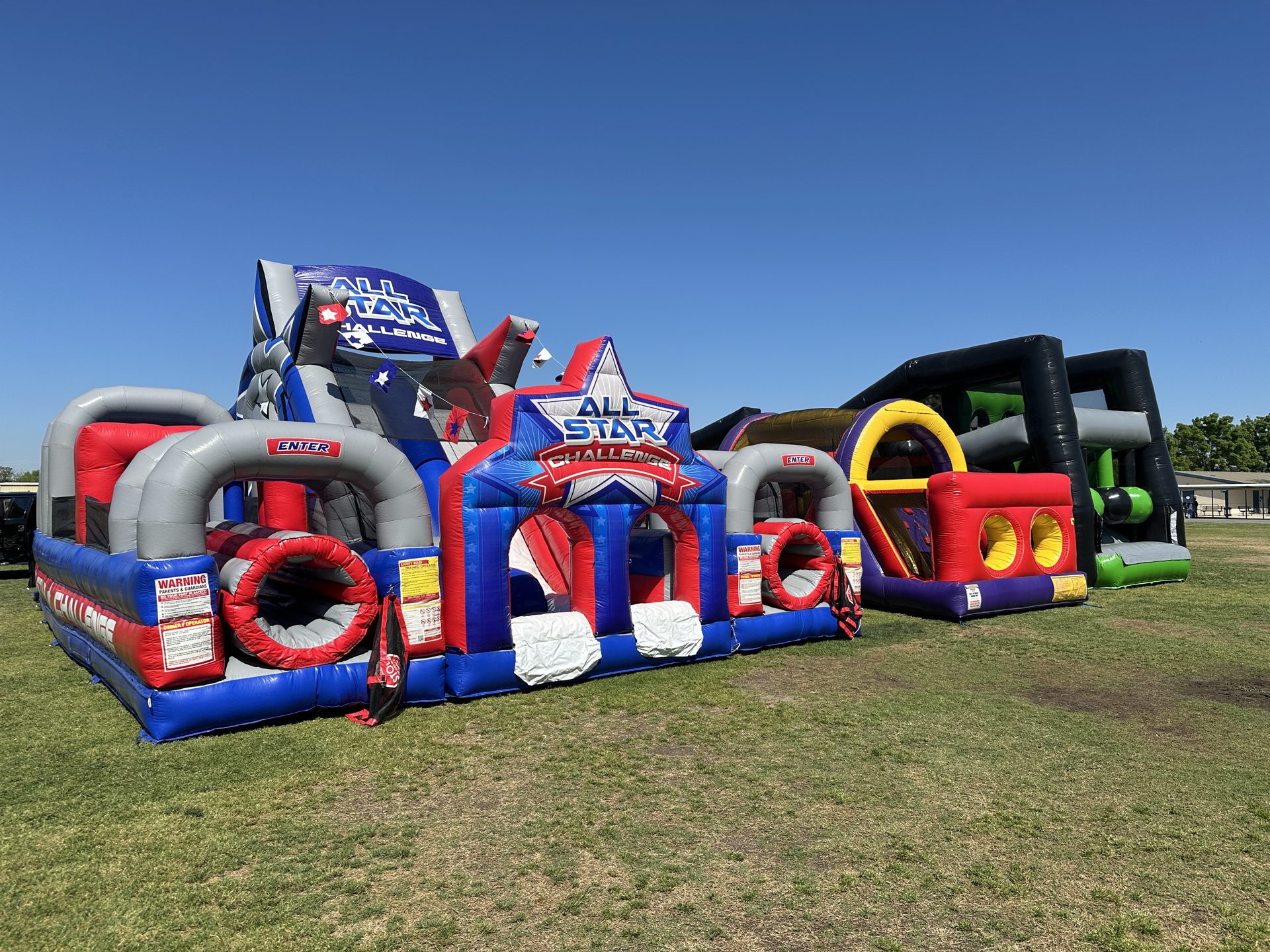 Several obstacle courses at a large event